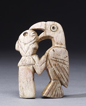 Bird and woman figurine